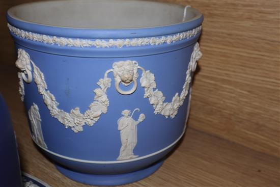 A Wedgwood 19th century blue and white Jasperware stilton dish and cover and two Jasperware jardinieres,